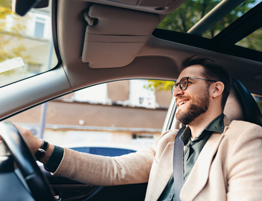 A man driving a car
