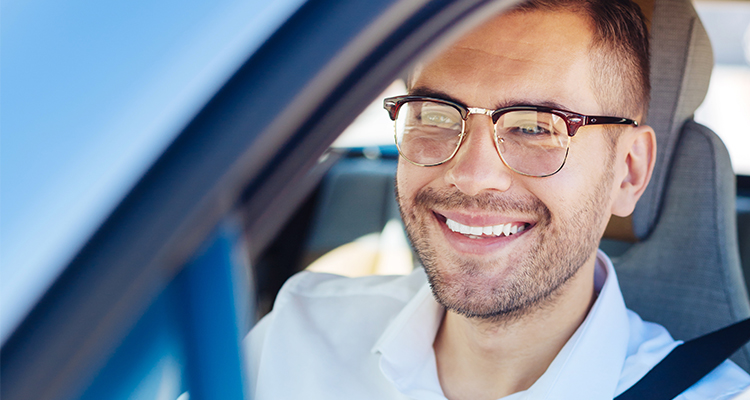 man in car